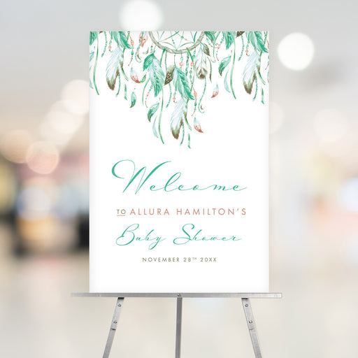 Boho baby shower welcome sign featuring a dreamcatcher, mint green feathers, and customized personalization.