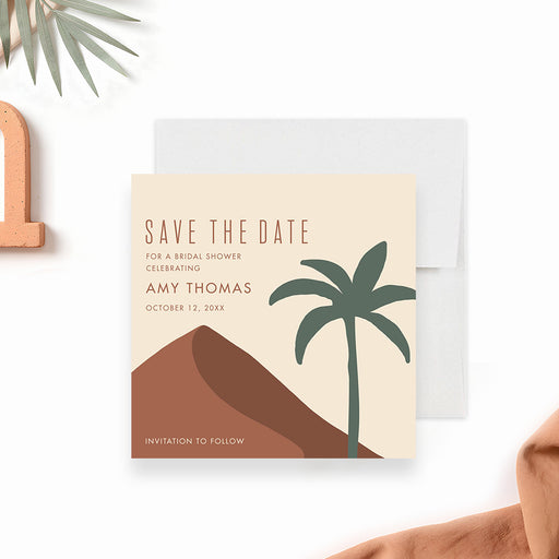 Boho bridal shower save the date card with terracotta desert hills, green palm tree, bride’s name and event date-front