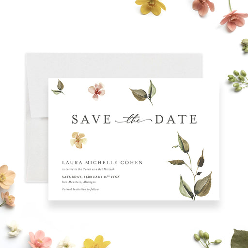 Botanical Bar or Bat Mitzvah save the date card with watercolor flowers and greenery shown with a white envelope-front