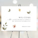 Botanical Bat Mitzvah welcome sign featuring delicate floral illustrations and elegant lettering for a stylish Jewish celebration.