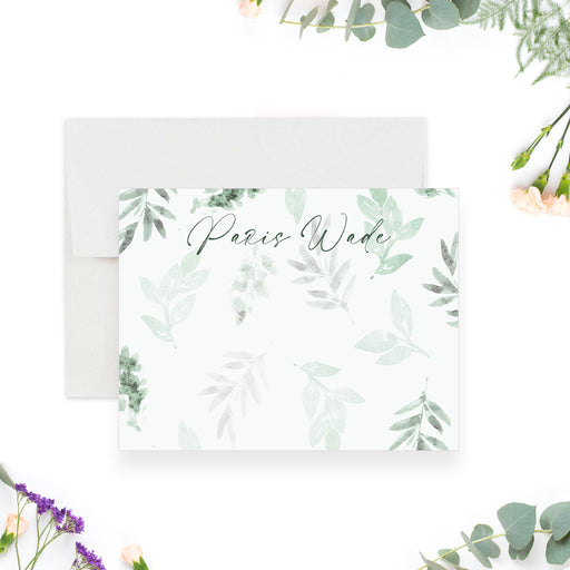 Elegant botanical note card featuring a lush green watercolor leaf design-front