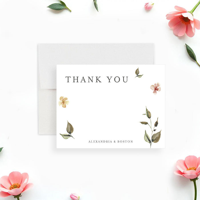 botanical wedding thank you card with soft watercolor flowers, greenery, and personalized couple names-front