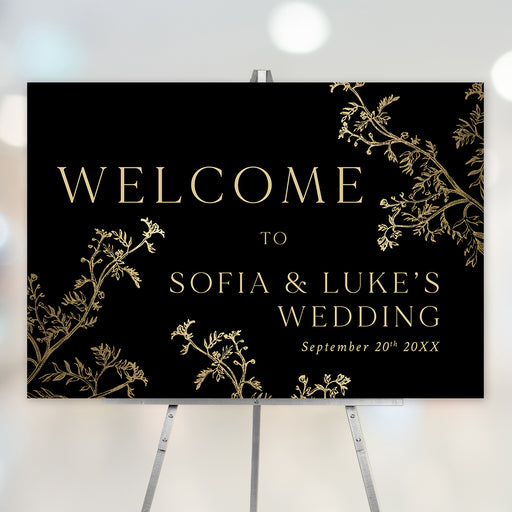 Elegant black and gold welcome sign with botanical accents, personalized event signage for weddings, anniversaries, and special occasions.