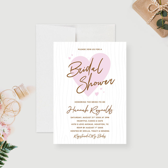 Bridal shower invitation card featuring a light pink hearts design-front