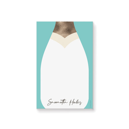 Personalized notepad with a champagne bottle illustration, perfect as a chic bridal shower gift for guests and bridesmaids.