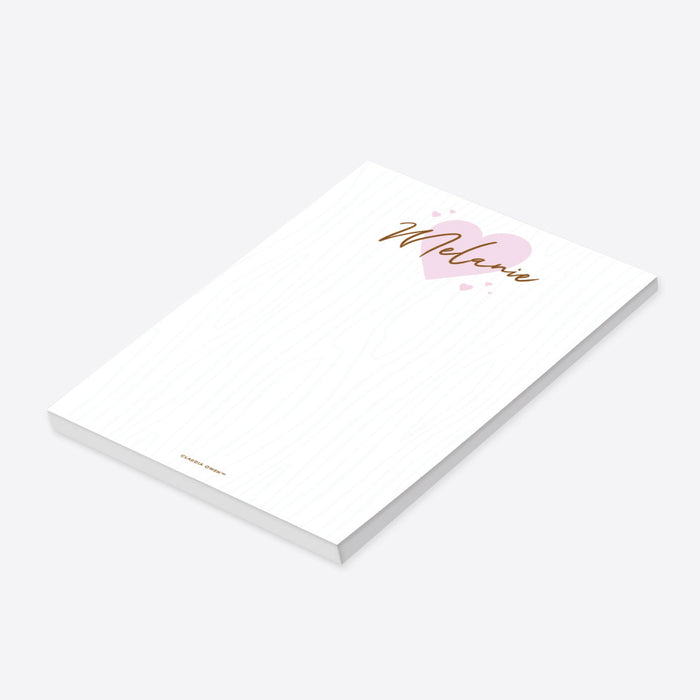 Personalized notepad featuring a light pink heart design-side