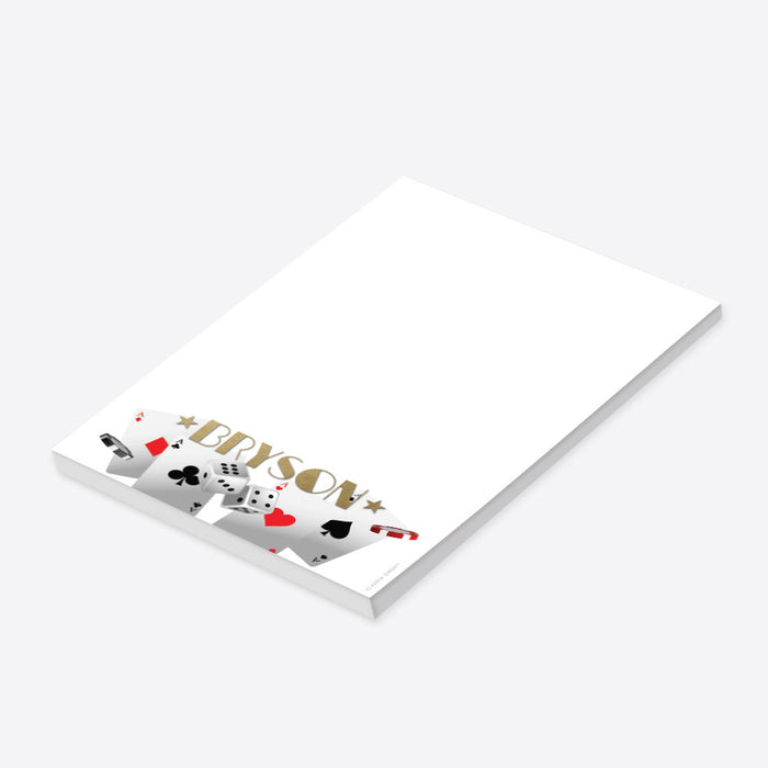 Casino night personalized notepad featuring playing cards, dice, poker chips, and name-side