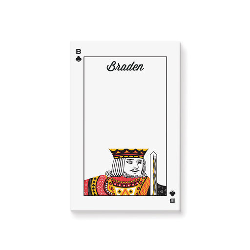 a notepad playing card with the king of spade