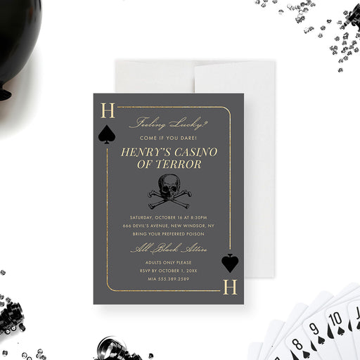 Dark casino-themed birthday invitation with a playing card, black spade icon, and skull illustration.-front