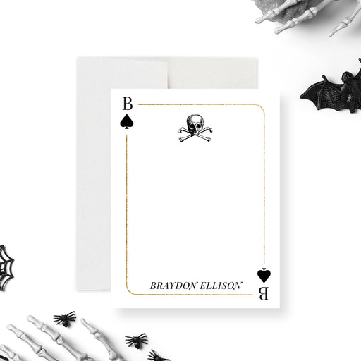Gothic note card with skull and spade playing card design, ideal for casino-themed party favors.-front