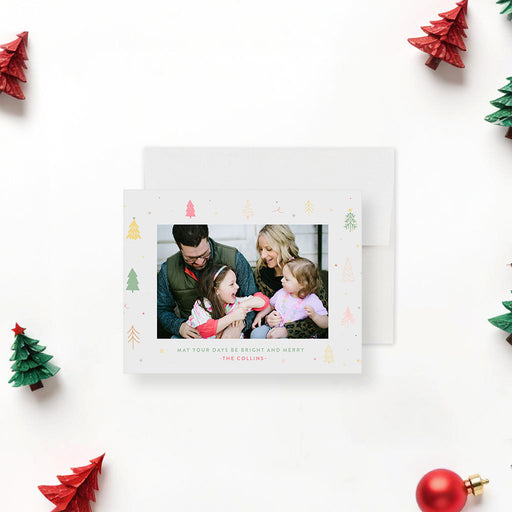 Personalized Christmas greeting card featuring a family photo, holiday tree design, and custom message, ideal for the holiday season.-front