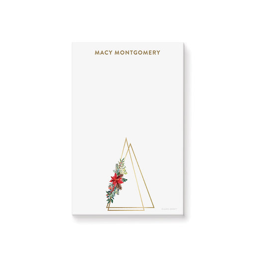personalized holiday notepad with gold line-art Christmas tree, poinsettia flowers, and custom name