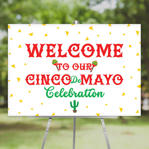Cinco de Mayo welcome sign with red and green lettering, maracas, cactus, and confetti that look like tortilla chips — perfect for fiesta celebrations.