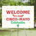 Cinco de Mayo welcome sign with red and green lettering, maracas, cactus, and confetti that look like tortilla chips — perfect for fiesta celebrations.