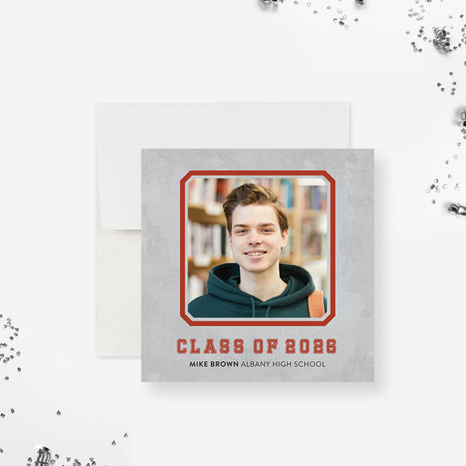 Modern Class of 2026 graduation photo announcement card with student portrait and red border design printed on gray background