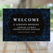 Black and blue customized welcome sign for an annual client appreciation dinner decoration