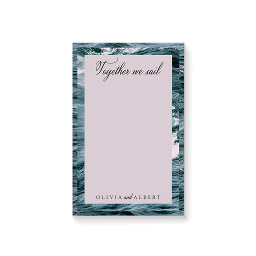 Personalized wedding notepad with blue ocean wave illustration and “Together we sail” text