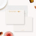 Cocktail Party Thank You Cards with Hors d'Oeuvres. Front and cream back with a small champagne glass illustration shown with a white envelope.