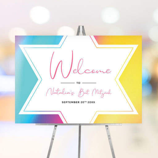 Colorful Bat Mitzvah welcome sign with a rainbow gradient background and a Star of David design