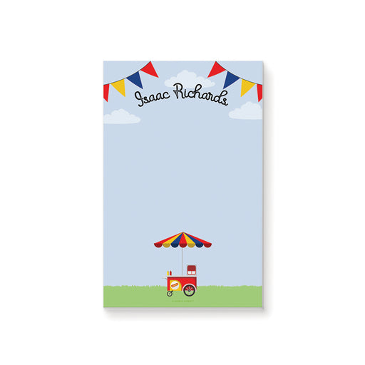 Personalized hot dog party notepad featuring a colorful food cart with striped umbrella and festive bunting.
