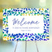 Personalized leopard-print birthday welcome sign with a colorful design, a custom party entrance sign for a kids' birthday celebration.