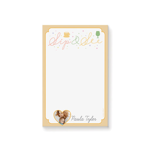Sip and see notepad featuring a heart-shaped photo with a pastel teacup and wine glass design, gift for new moms or baby shower guests.