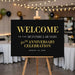 40th corporate anniversary welcome sign with black background, gold-style lettering, and personalized business event details displayed on an easel
