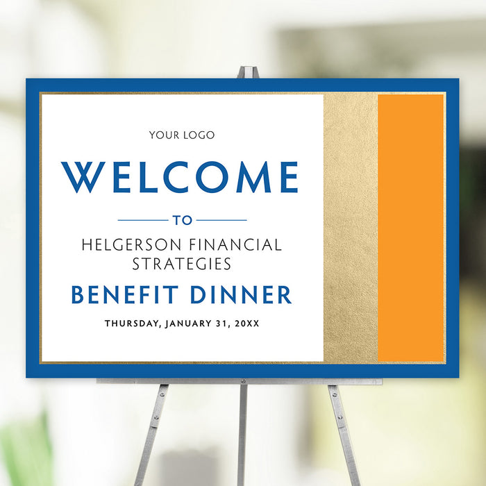 Elegant personalized welcome sign with blue, gold, and orange accents displayed at the entrance to a corporate or charity event.