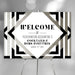 corporate cocktail party welcome sign with black and silver geometric design for a business event with cocktails and hors d’oeuvres
