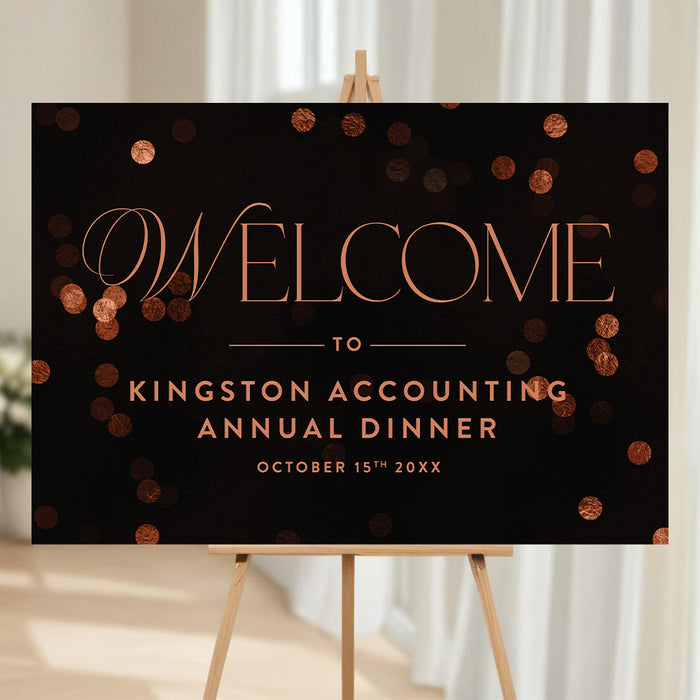 corporate annual dinner welcome sign with elegant lettering on a black background and warm confetti accents for a business event
