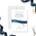corporate open house invitation with navy ribbon, scissors illustration, new office ribbon cutting details, and custom event wording-front