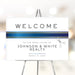 corporate open house welcome sign with blue ribbon design, scissors illustration, business name, and ribbon cutting event details