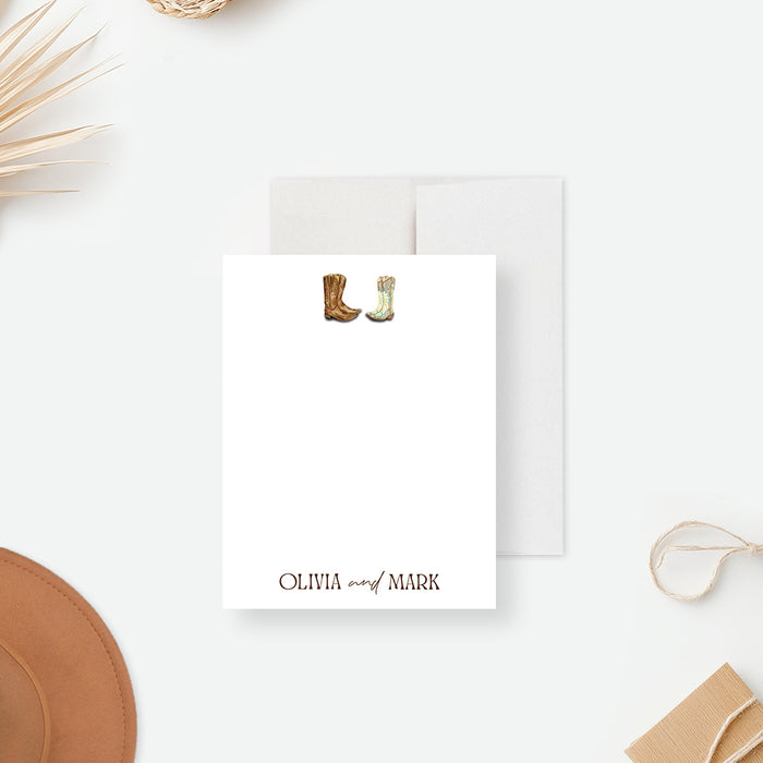 Rustic western wedding thank you card featuring cowboy boots on a wooden background with elegant rustic typography.-front
