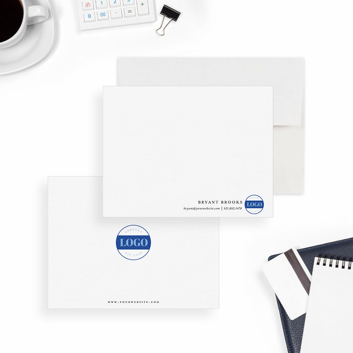 White business note card personalized with a company name, logo and contact details along the bottom.