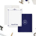 A set of personalized note cards with a blue and white color scheme, including a custom monogram design on the back of one card.