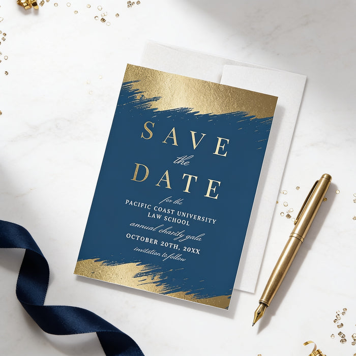 a blue and gold wedding invitation card with the text "Save the Date" and "Pacific Coast University Law School" printed on it, along with details about an upcoming event. The card is accompanied by a gold pen and scattered gold confetti on a white surface.