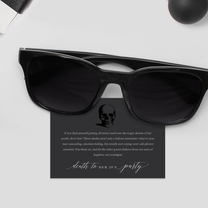 Death to Your 20s sunglasses favor tag shown with a pair of sunglasses.