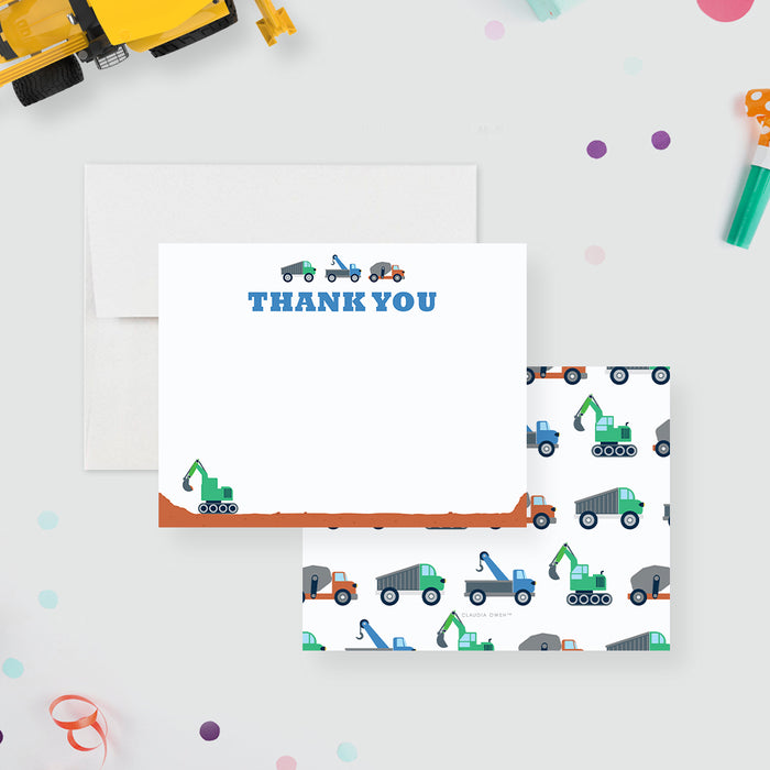 Dump Truck Birthday Thank You Cards for Kids. Front and matching colorful dump trucks and excavators patterned across a white back displayed with a white envelope.