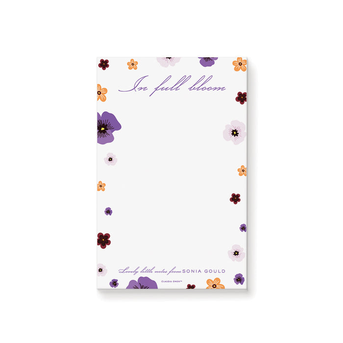 Floral spring notepad with pastel flowers and “In full bloom” text