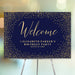 Personalized welcome sign with navy blue and gold confetti, elegant birthday party entry décor. 