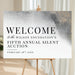 Elegant charity event welcome sign with a neutral and black design, ideal for silent auctions and corporate event entrances