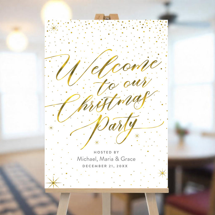 Christmas party welcome sign with gold script lettering on white background displayed on easel for holiday event entrance decor