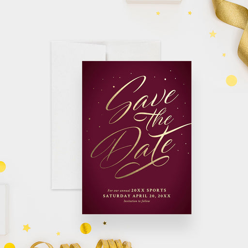 a bungundy and gold save the date card