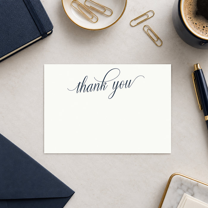 Elegant personalized thank-you card with navy script and matching envelope-front