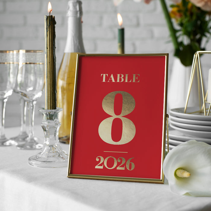 elegant 2026 new year party table number card in red and gold design