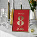 elegant 2026 new year party table number card in red and gold design