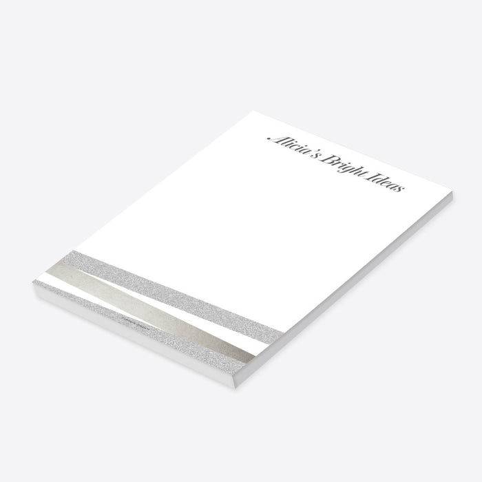 Personalized notepad with custom name, elegant neutral tones, and modern stripe design on a clean white writing pad-side