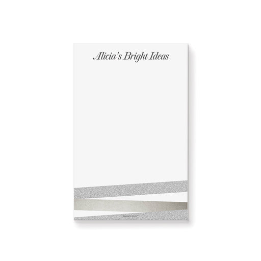 Personalized notepad with custom name, elegant neutral tones, and modern stripe design on a clean white writing pad.