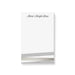 Personalized notepad with custom name, elegant neutral tones, and modern stripe design on a clean white writing pad.