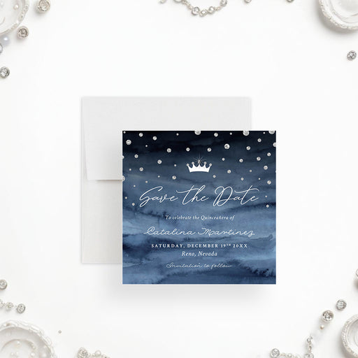 Elegant quinceañera save the date featuring a navy blue watercolor background with sparkling diamonds and crown-front